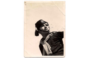 Bob wearing Balilla uniform (Italian version of Hitler Youth)	