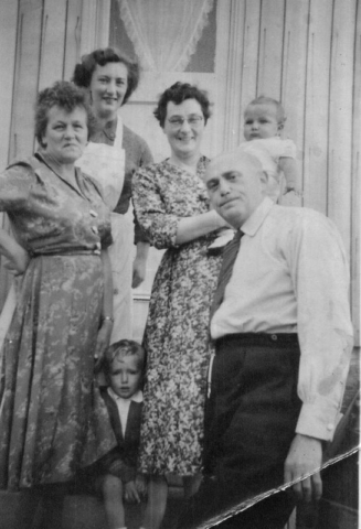 Last photograph of my parents, taken in 1958, both died 1968