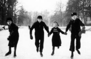 Dorrith Sim skating with two Hitler Youth