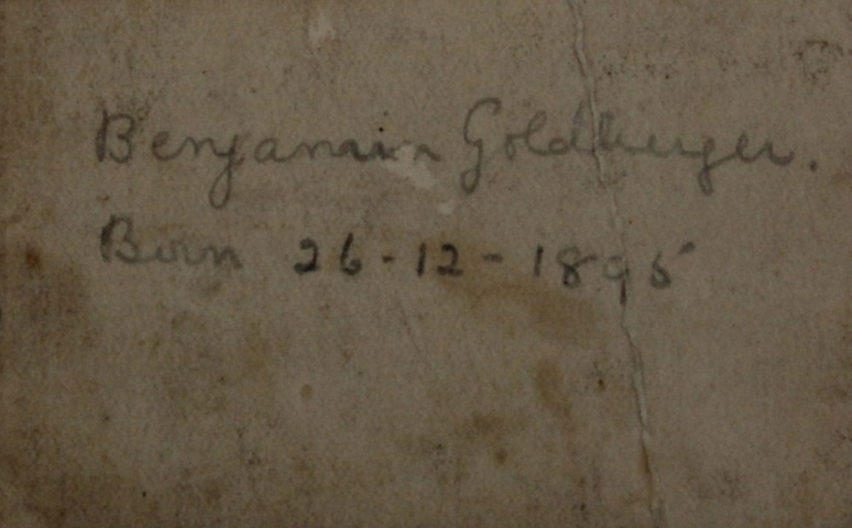 Father's details behind photograph