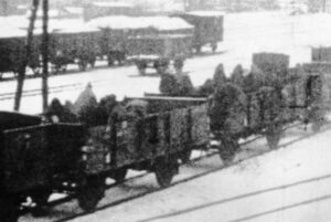 Prisoners being transported in open freight cars winter 1945