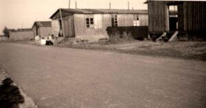 Valka camp, wooden huts which were later demolished
