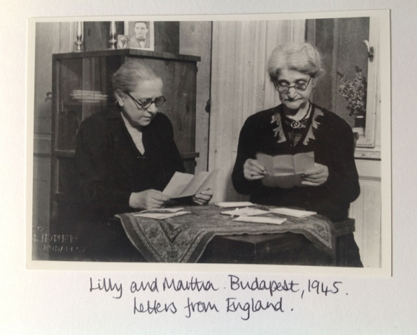 Lilly and Martha in Budapest in 1945 reading letters from England